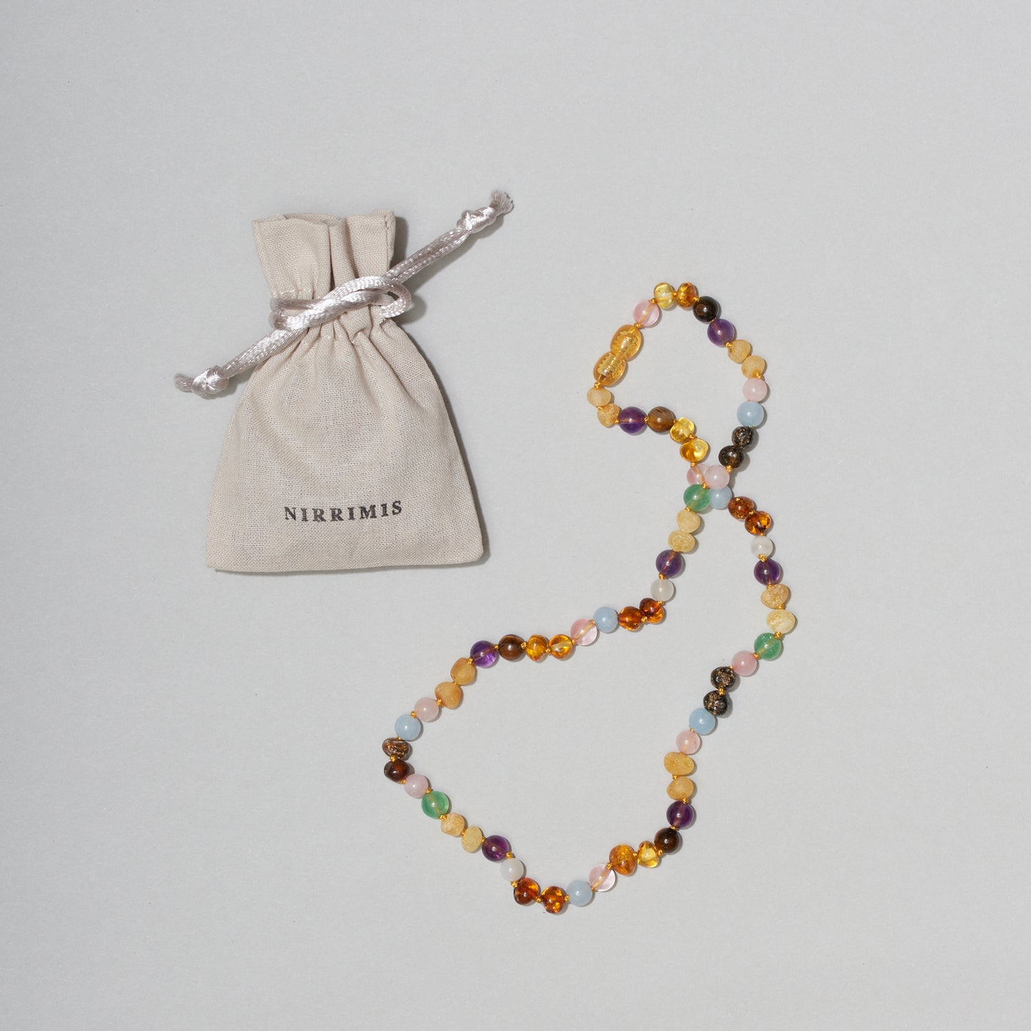 Bernsteinkette Rainbow Kids (0-3J.) - Nirrimis